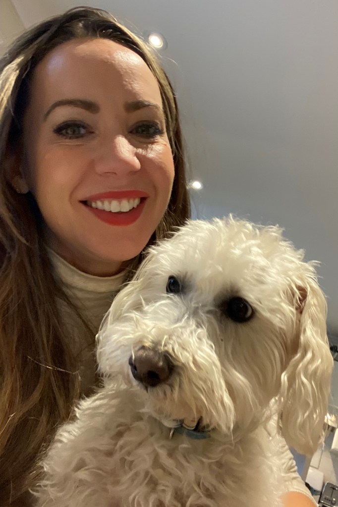 Photo of Carys Craig with Brodie the dog